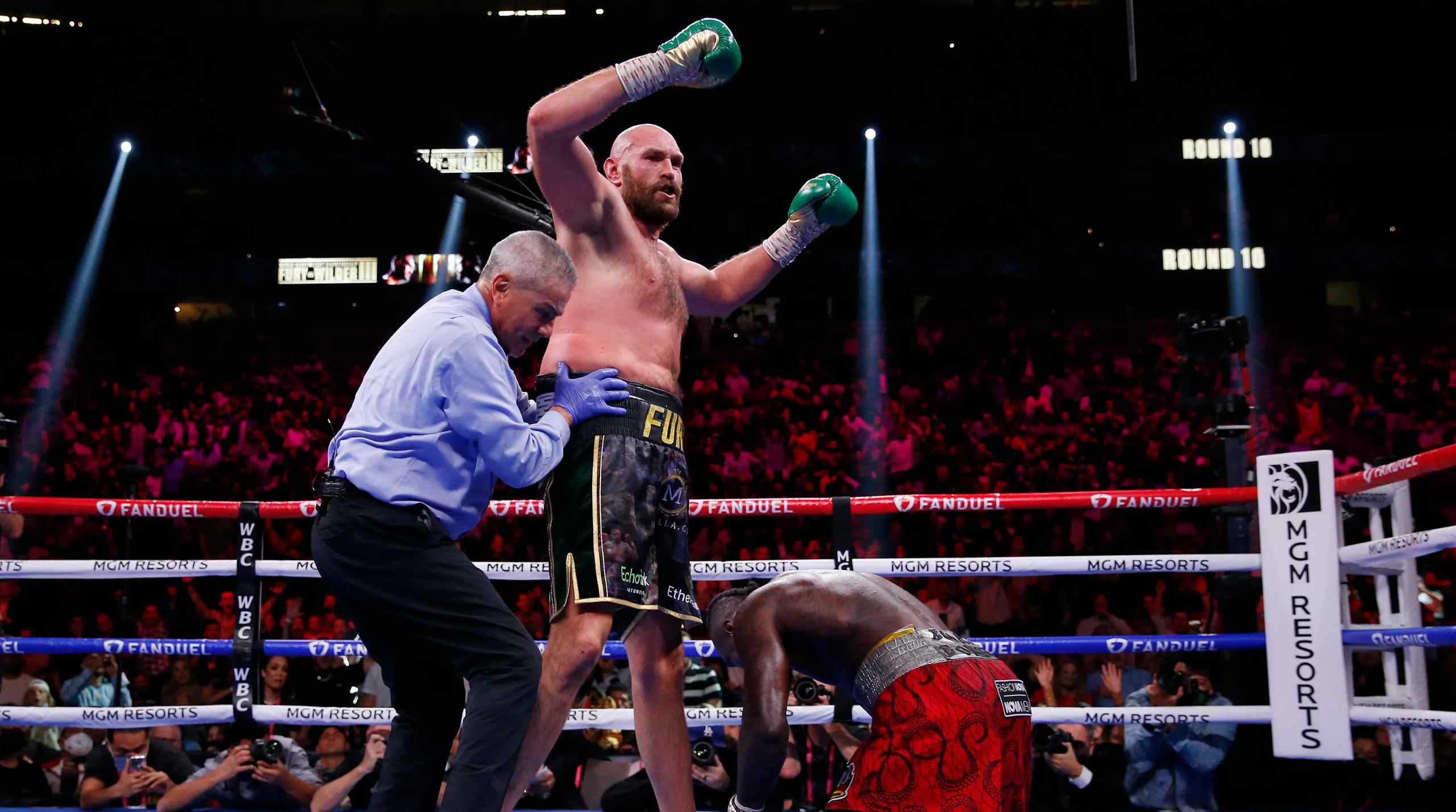 Tyson Fury cheering after knocking down an opponent.